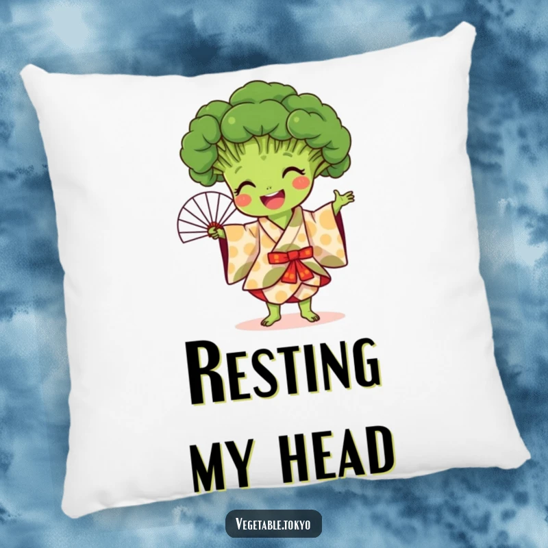 Funny pillow showcasing a joyful broccoli in a patterned kimono, doing a fan dance, offering cozy comfort and artistic humor.