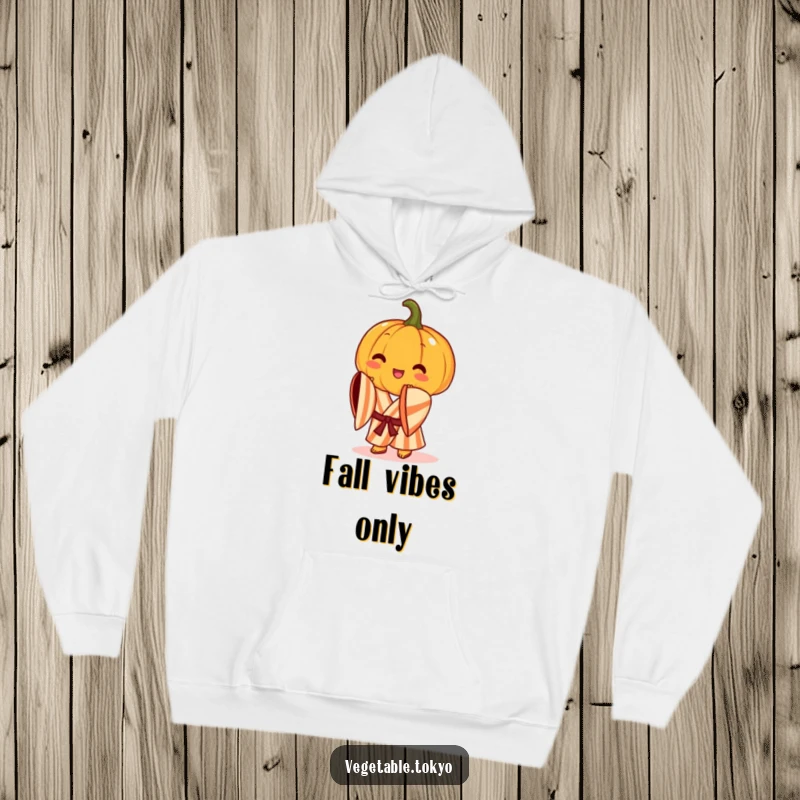 Funny hoodie featuring a cheerful pumpkin in a striped kimono, performing a graceful bow, offering warmth and autumn humor.